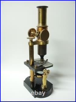 Ancien Microscope monoculaire en bronze dans sa boîte d'origine XIX-XXe siècle