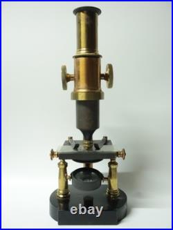 Ancien Microscope monoculaire en bronze dans sa boîte d'origine XIX-XXe siècle