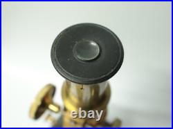Ancien Microscope monoculaire en bronze dans sa boîte d'origine XIX-XXe siècle