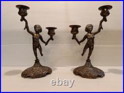 Ancienne paire de bougeoirs aux putti style Napoléon III XIXe siècle