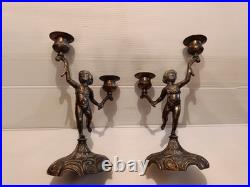 Ancienne paire de bougeoirs aux putti style Napoléon III XIXe siècle