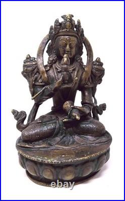 Belle figurine chinoise/tibétaine en bronze représentant Tara Verte, XIXe siècle Belle figurine chinoise/tibétaine en bronze représentant Tara Verte, XIXe siècle