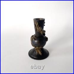 Bougeoir chinois en bronze patiné, décor au dragon impérial Fin XIXe siècle