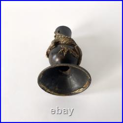 Bougeoir chinois en bronze patiné, décor au dragon impérial Fin XIXe siècle