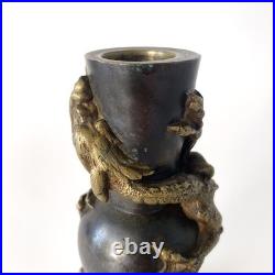 Bougeoir chinois en bronze patiné, décor au dragon impérial Fin XIXe siècle