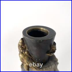 Bougeoir chinois en bronze patiné, décor au dragon impérial Fin XIXe siècle