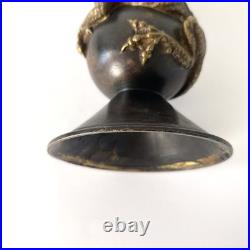 Bougeoir chinois en bronze patiné, décor au dragon impérial Fin XIXe siècle