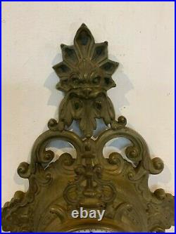 Cartel d'applique en bronze ciselé a décor de mascaron XIX siècle