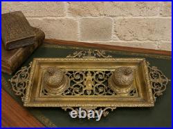 Encrier en bronze, datant du XIXe siècle, présentant un riche décor Renaissance