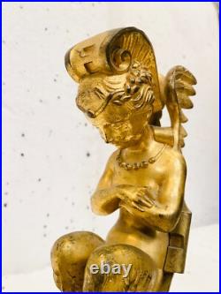 Faunes ailées formant chenets en bronze ciselé trace de dorure. XIX siècle