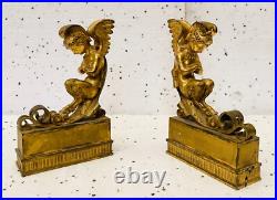 Faunes ailées formant chenets en bronze ciselé trace de dorure. XIX siècle