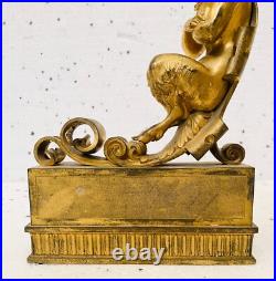 Faunes ailées formant chenets en bronze ciselé trace de dorure. XIX siècle