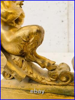 Faunes ailées formant chenets en bronze ciselé trace de dorure. XIX siècle