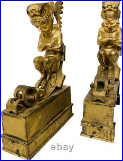 Faunes ailées formant chenets en bronze ciselé trace de dorure. XIX siècle