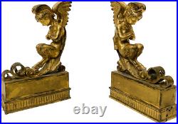 Faunes ailées formant chenets en bronze ciselé trace de dorure. XIX siècle