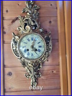 Horloge cartel en bronze du XIXe siecle