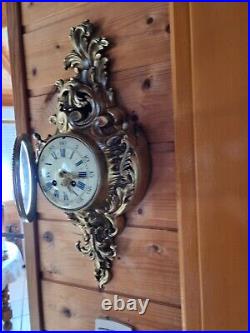 Horloge cartel en bronze du XIXe siecle