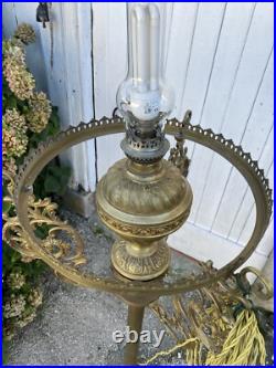 Lampadaire en bronze Et Laiton doré décor de feuillage XIX siècle
