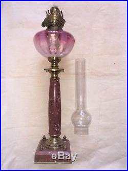 Lampe à pétrole 72 cm XIXe siècle pierre rouge et bronze