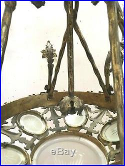 Lustre en bronze et verre taillé Six bras de lumière Coupe centrale XIX siècle