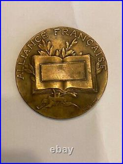 MEDAILLE en BRONZE signée DANIEL DUPUIS 68mm ALLIANCE FRANÇAISE COLONIES