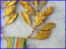 Médaille exposition commerciale universelle Paris avec feuilles laurier chêne