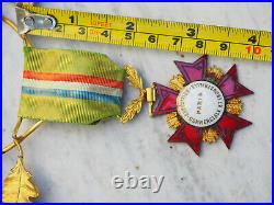 Médaille exposition commerciale universelle Paris avec feuilles laurier chêne