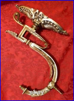 Paire d'appliques murales en bronze doré à décor de feuilles XIX Siècle