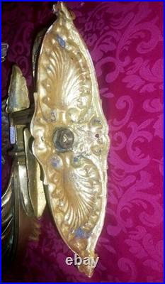 Paire d'appliques murales en bronze doré à décor de feuilles XIX Siècle