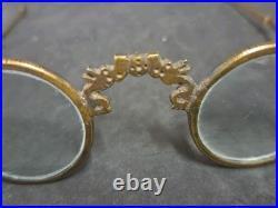 Paire de Lunettes anciennes en bronze décor dragons asiatiques Chine XIXe siècle