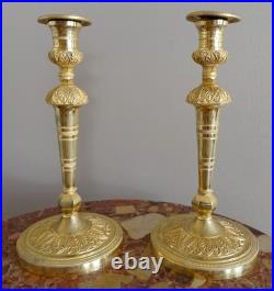 Paire de bougeoirs Empire en bronze doré XIXe siècle Paire de bougeoirs Empire en bronze doré XIXe siècle