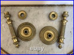 Paire de bougeoirs de style Louis XVI en bronze doré ciselé France XIXe siècle