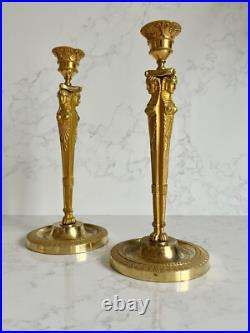 Paire de bougeoirs en bronze doré Retour d'Egypte Empire -XIXe siècle, France Paire de bougeoirs en bronze doré Retour d'Egypte Empire -XIXe siècle, France