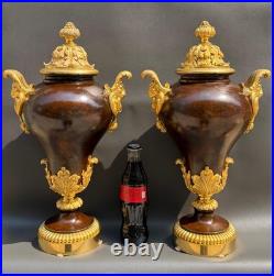 Paire de cassolettes néoclassiques en bronze patiné et bronze doré XIXe siècle
