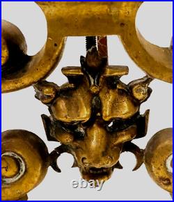 Paire de chenets porte buches de style Renaissance en bronze doré XIX siècle
