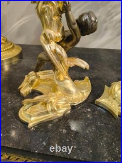 Paire de flambeaux aux putti, style Louis XV, d'après Meissonnier XIXe siècle