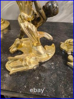 Paire de flambeaux aux putti, style Louis XV, d'après Meissonnier XIXe siècle