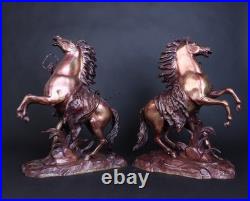 Paire de modèles français en bronze XIXe siècle les chevaux de Marly par