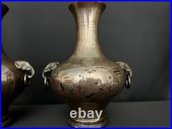 Paire de vases en bronze incrusté Indochine, XIXe siècle Paire de vases en bronze incrusté Indochine, XIXe siècle