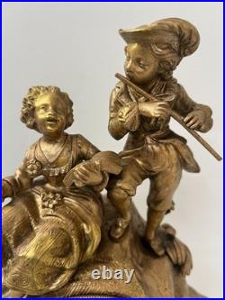 Pendule Romantique en bronze doré XIX siècle