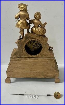 Pendule Romantique en bronze doré XIX siècle