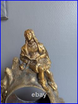Pendule ancienne en bronze doré Homme à la lecture XIXe siècle