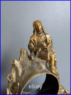 Pendule ancienne en bronze doré Homme à la lecture XIXe siècle