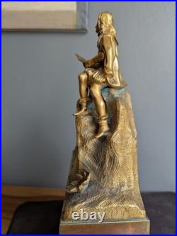 Pendule ancienne en bronze doré Homme à la lecture XIXe siècle