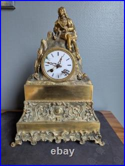Pendule ancienne en bronze doré Homme à la lecture XIXe siècle