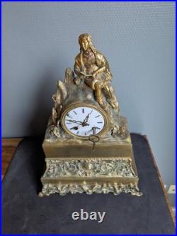 Pendule ancienne en bronze doré Homme à la lecture XIXe siècle