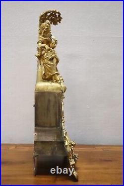 Pendule ancienne en bronze doré du XIXe siècle