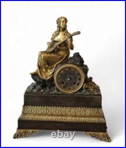 Pendule bronze doré XIX Siècle Pendule bronze doré XIX Siècle