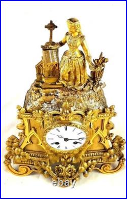 Pendule bronze dore style romantique Barbe d'Héliopolis XIXe siècle Vincenti