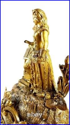 Pendule bronze dore style romantique Barbe d'Héliopolis XIXe siècle Vincenti